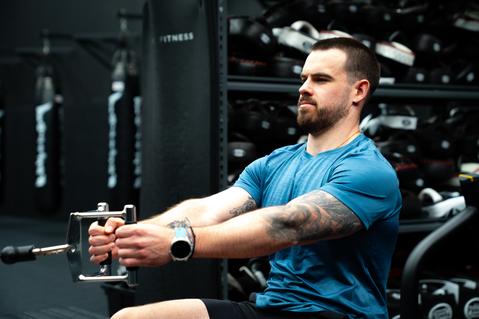 Athlete performing a seated cable row in the gym